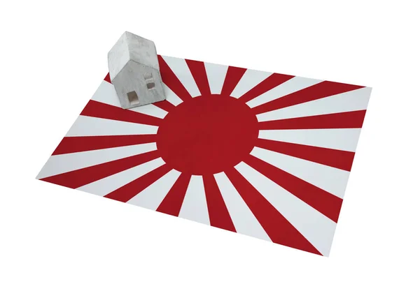 Litet hus på en flagga - Japan — Stockfoto