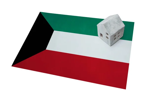 La casa pequeña sobre la bandera - Kuwait —  Fotos de Stock