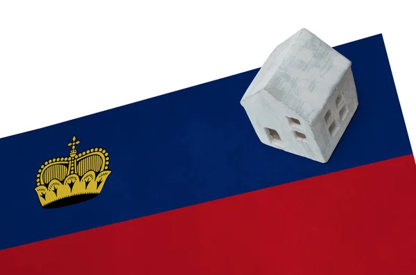 Small house on a flag - Liechtenstein — Stock Photo, Image