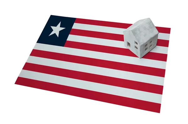Huisje op een vlag - Liberia — Stockfoto