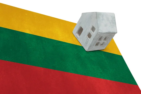 Small house on a flag - Lithuania — Stock Photo, Image