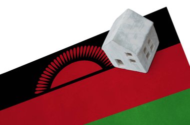 Bir bayrak - Malavi üzerinde küçük ev