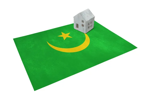 Kleines Haus auf einer Fahne - Mauretanien — Stockfoto
