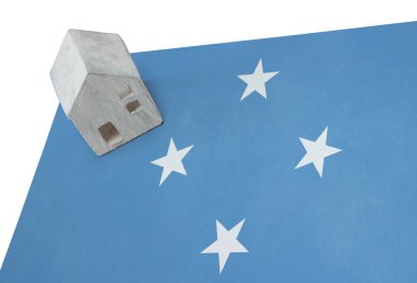 Bir bayrak - Mikronezya üzerinde küçük ev