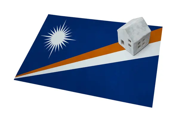 Small house on a flag - Marshall Islands — Stock Photo, Image