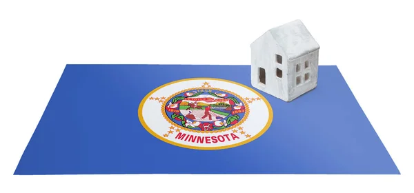 Litet hus på en flagga - Minnesota — Stockfoto