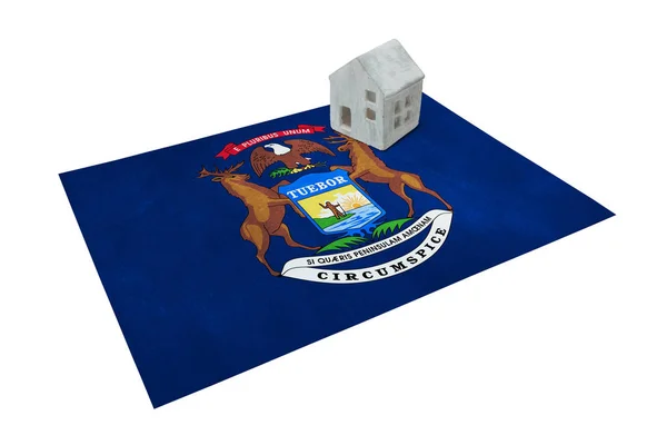 Small house on a flag - Michigan — Stock Photo, Image