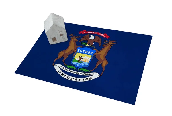 Small house on a flag - Michigan — Stock Photo, Image