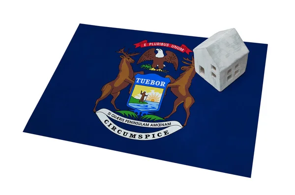 Pequeña casa en una bandera - Michigan — Foto de Stock