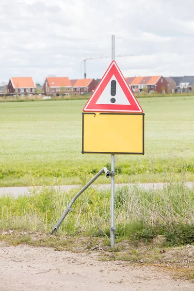 Red and white road traffic warning sign — Stock Photo, Image