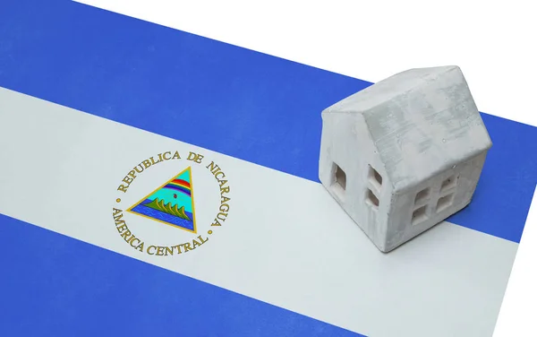 Small house on a flag - Nicaragua — Stock Photo, Image