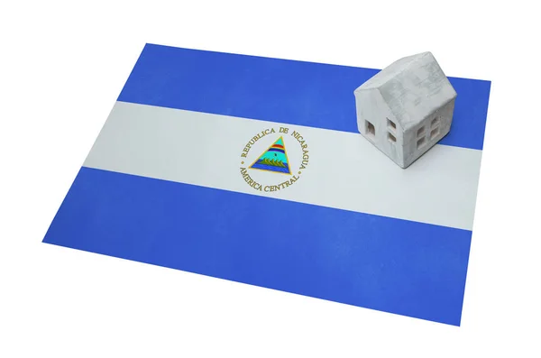 Small house on a flag - Nicaragua — Stock Photo, Image