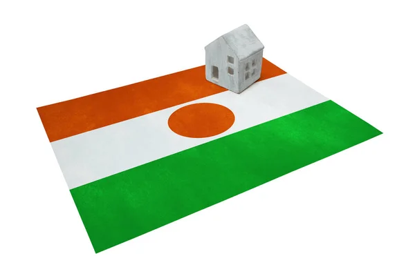 Small house on a flag - Niger — Stock Photo, Image