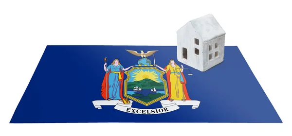 Small house on a flag - New York — Stock Photo, Image