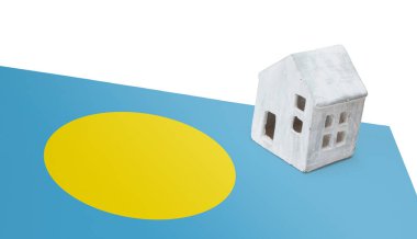 Bir bayrak - Palau üzerinde küçük ev