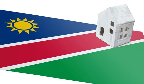 Petite maison sur un drapeau Namibie — Photo