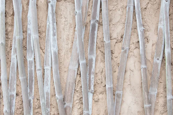 Bamboo texture in poured concrete wall — Stock Photo, Image