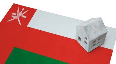 Bir bayrak - Umman üzerinde küçük ev