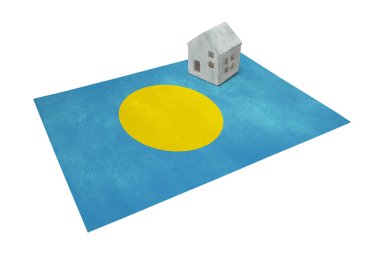 Bir bayrak - Palau üzerinde küçük ev