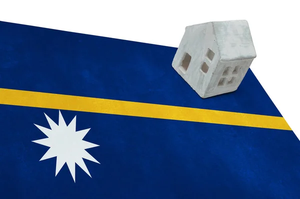 Small house on a flag - Nauru — Stock Photo, Image