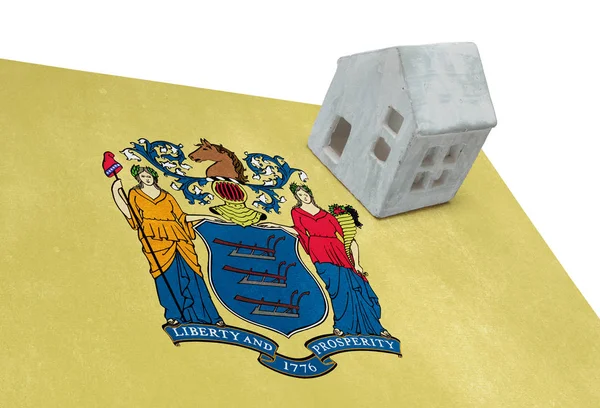 Piccola casa su una bandiera - New Jersey — Foto Stock