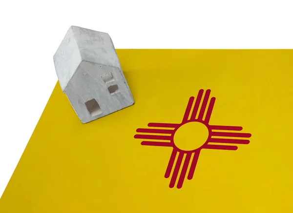 Small house on a flag - New Mexico — Stock Photo, Image