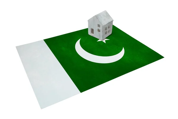 Huisje op een vlag - Pakistan — Stockfoto