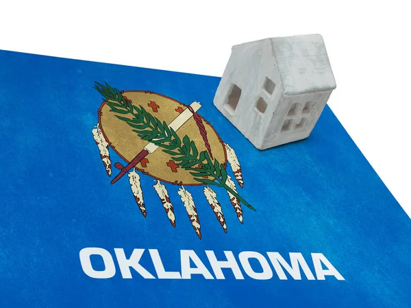 Small house on a flag - Oklahoma — Stock Photo, Image