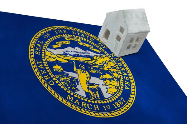 Litet hus på en flagga - Nebraska — Stockfoto