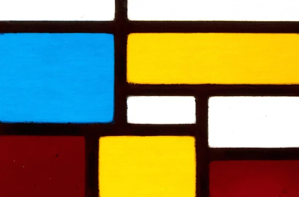 Pestrobarevné mozaikové okno — Stock fotografie