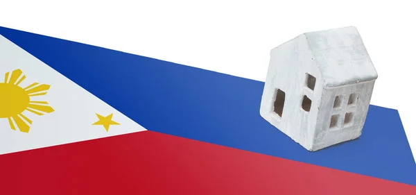 Piccola casa su una bandiera - Filippine — Foto Stock
