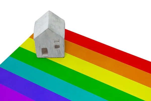 Huisje op een vlag - Regenboogvlag — Stockfoto