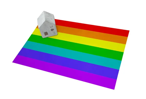 Huisje op een vlag - Regenboogvlag — Stockfoto