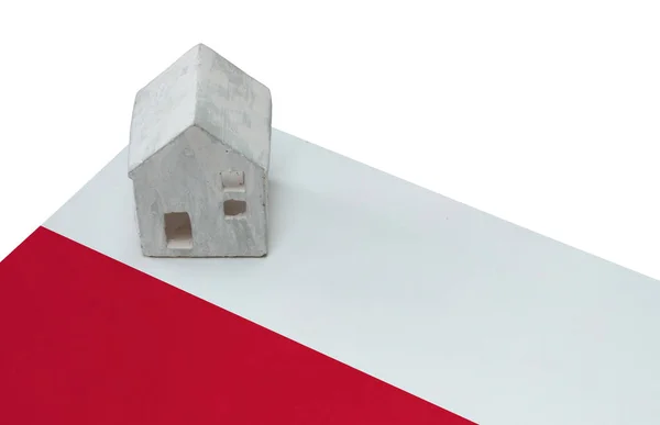 Pequena casa em uma bandeira - Polônia — Fotografia de Stock