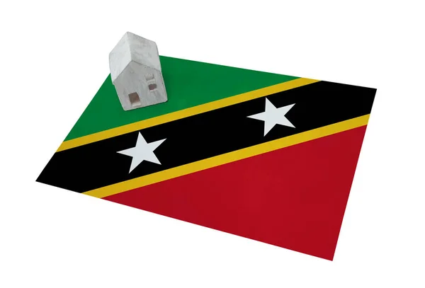 Small house on a flag - Saint Kitts and Nevis — Stock Photo, Image
