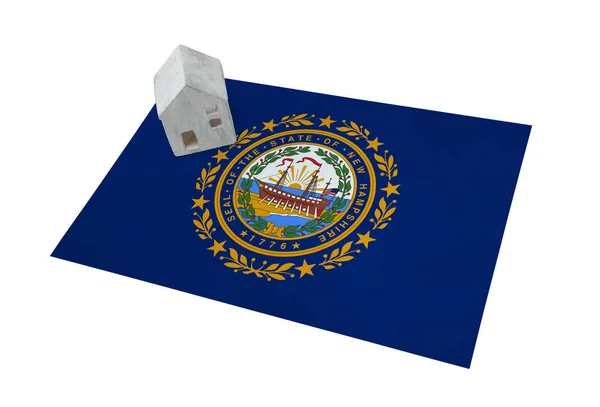 Small house on a flag - New Hampshire — Stock Photo, Image