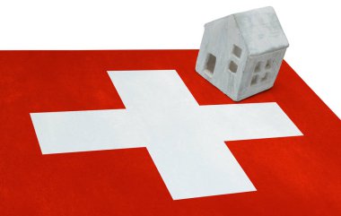 Bir bayrak - İsviçre üzerinde küçük ev