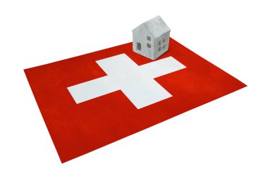 Bir bayrak - İsviçre üzerinde küçük ev