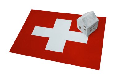 Bir bayrak - İsviçre üzerinde küçük ev