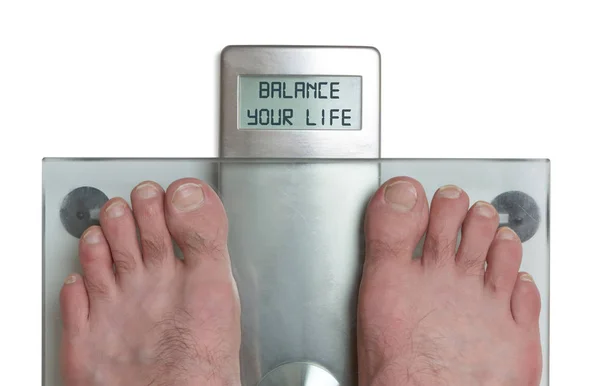 Man's feet on weight scale - Balance your life — Stock Photo, Image