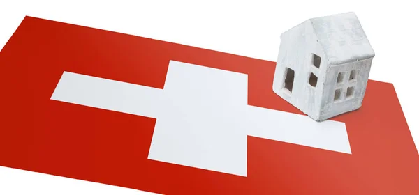 Petite maison sur un drapeau - Suisse — Photo