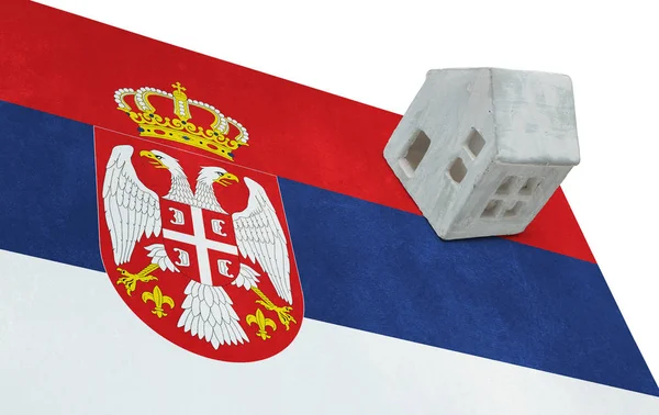 Small house on a flag - Serbia — Stock Photo, Image