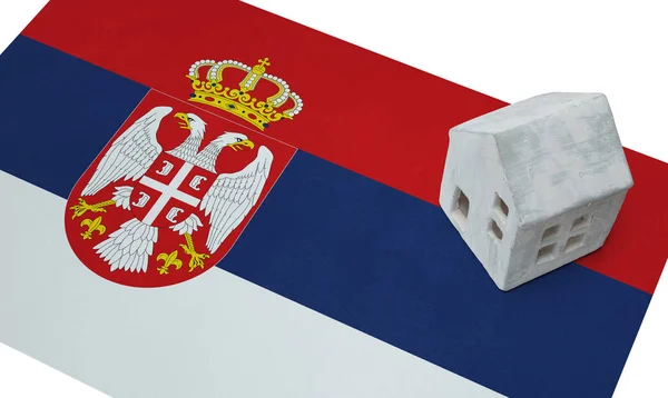 Huisje op een vlag - Servië — Stockfoto