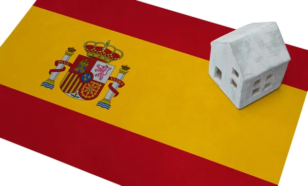 Маленький дом на флаге - Испания — стоковое фото