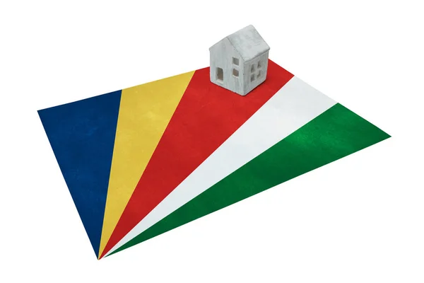 Small house on a flag - Seychelles — Stock Photo, Image