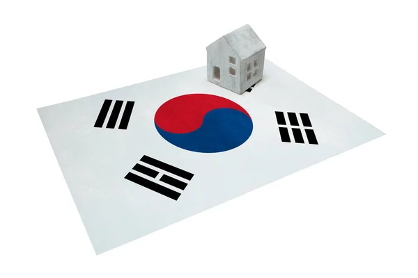 Pequeña casa en una bandera - Corea del Sur —  Fotos de Stock