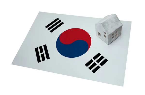 Small house on a flag - South Korea — Stock Photo, Image