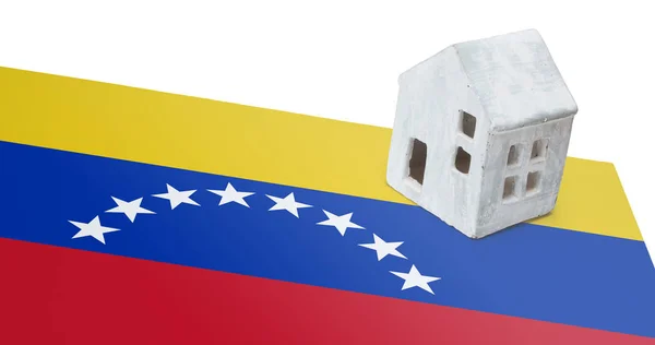 Bir bayrak - Venezuela üzerinde küçük ev — Stok fotoğraf