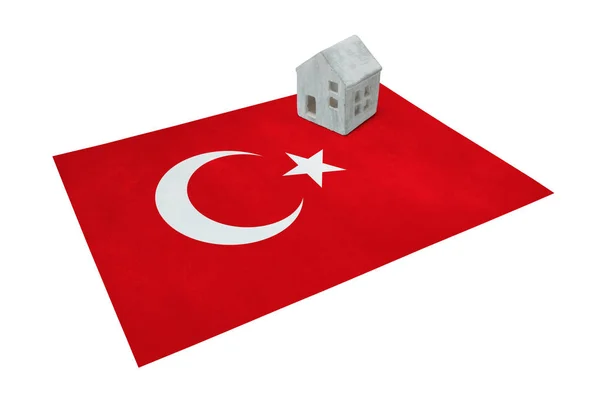 Small house on a flag - Turkey — Stock Photo, Image