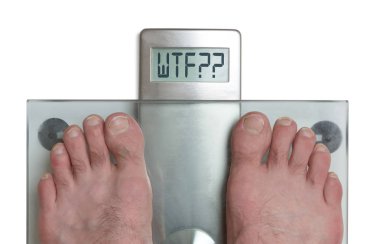 Adamın ayakları üzerinde ağırlık ölçek - Wtf!!!